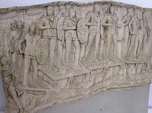 Roman auxiliary infantry crossing a river, probably the Danube, on a pontoon bridge during the emperor Trajan's Dacian Wars (101–106 AD)