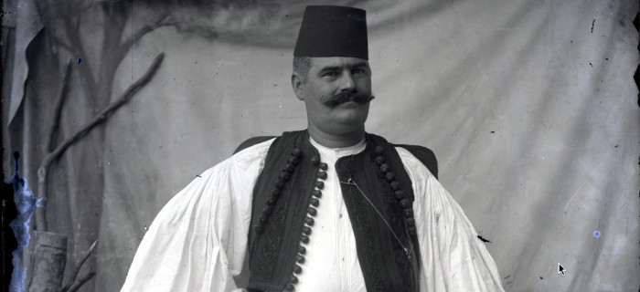 Vlach from the village Syrrako, near Ioannina in Greece, dressed in Vlach folk costume. In Manaki's atelier in Ioannina. 1900